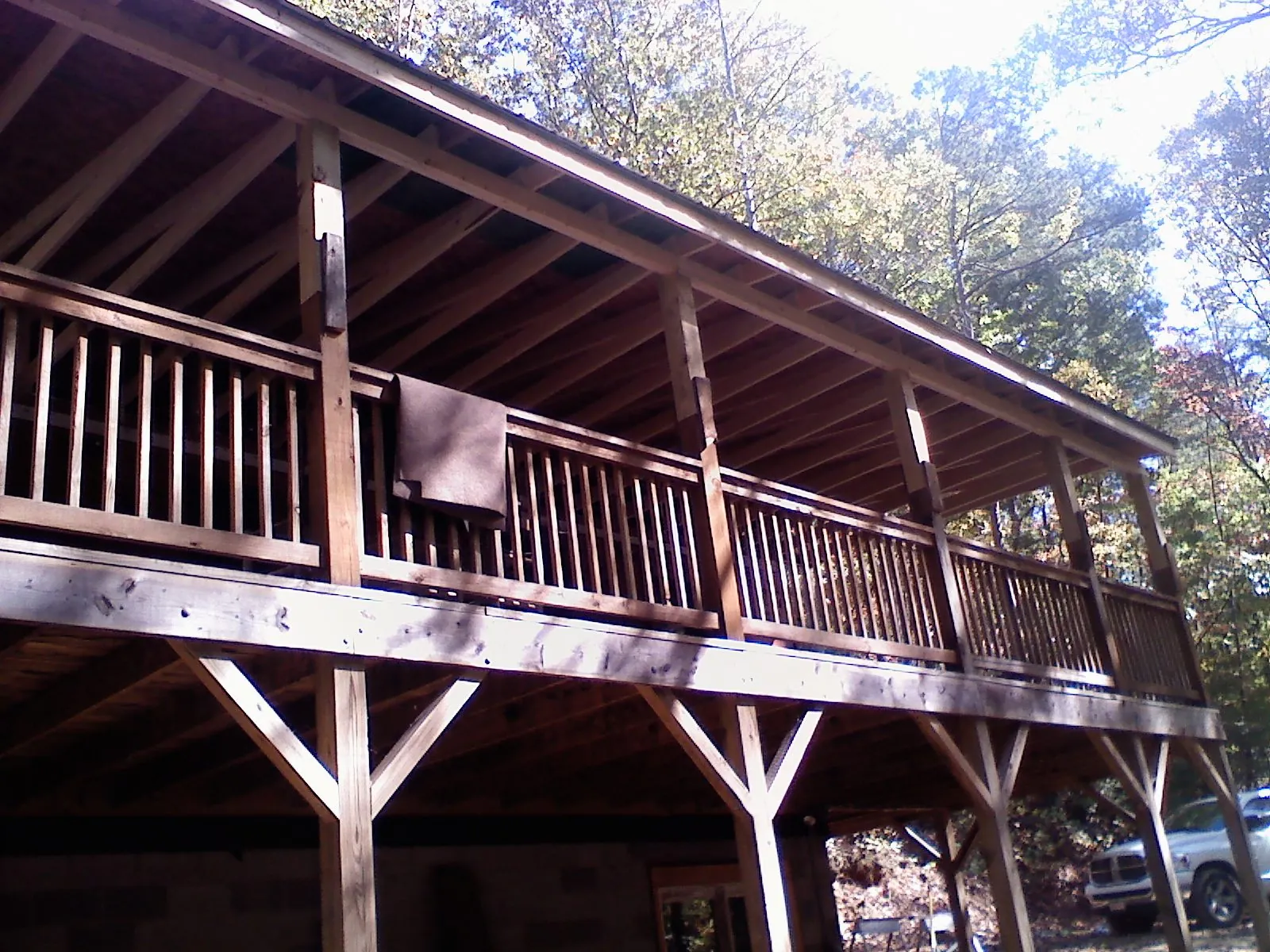 Timber framing under a new elevated porch and deck — Roof Leak Repair in Black River Falls by Roofing Brothers
